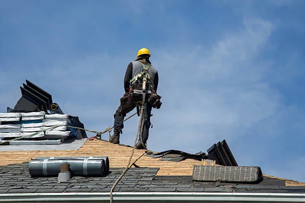Professional Roof Replacement technician working in Warren, RI